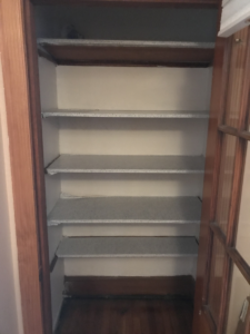 old closet shelving in a house in woburn ma