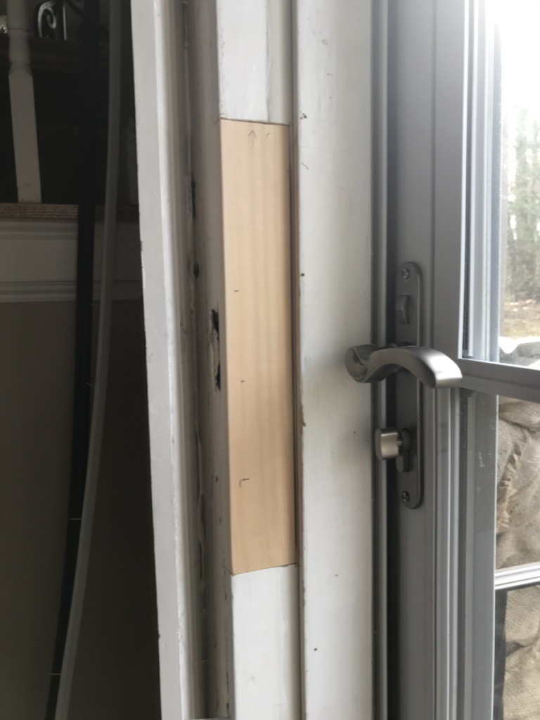 cracked door jamb that has been replaced with a new piece