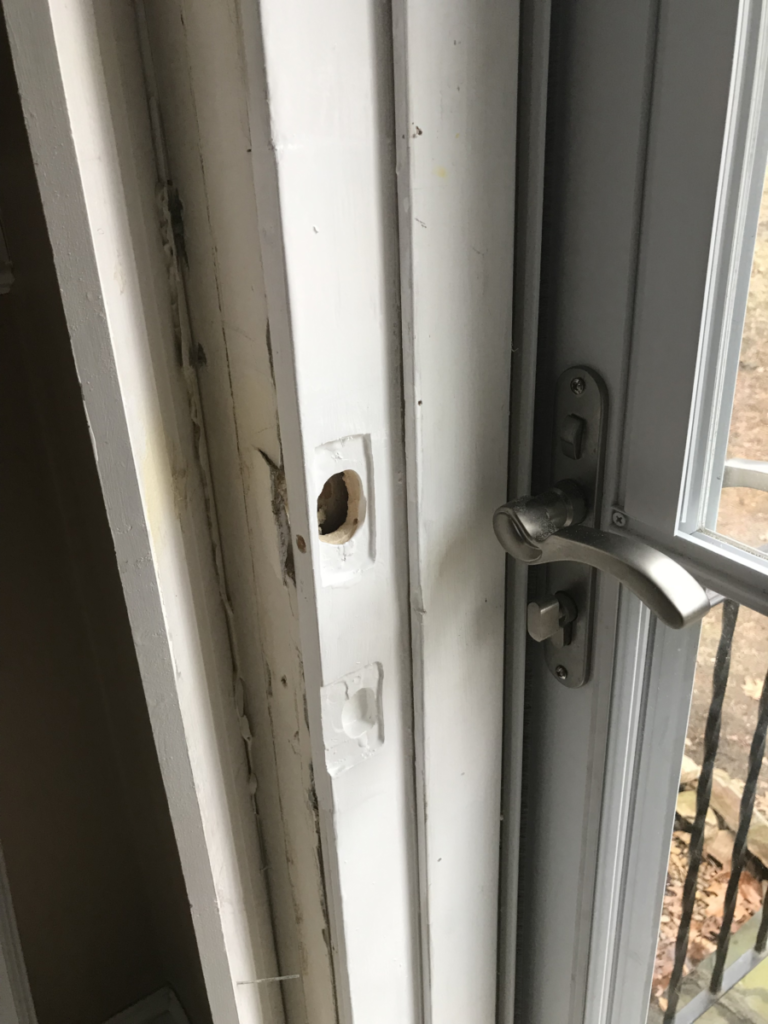 split section of wood on a door jamb replaced with a new piece