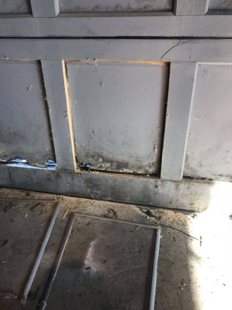 Replacing Rotted Wood Panels on a Garage Door That's Fixable LLC