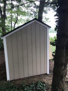 outdoor shed remodel with new siding and trim