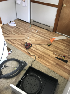 small kitchen remodel with new laminate flooring