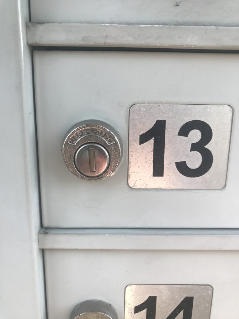 closeup of a mailbox lock